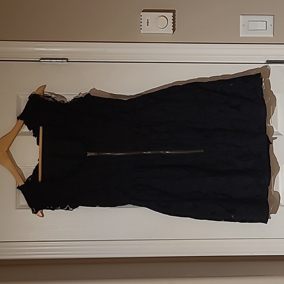 Little black lace dress. Size large. Pockets. Super cute and very comfortable. - Picture 2 of 4